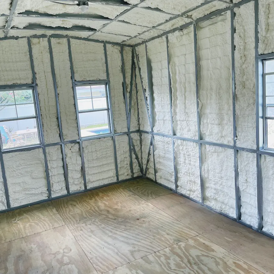 Closed-cell spray foam insulation applied to wall cavities in a residential project in Mahwah